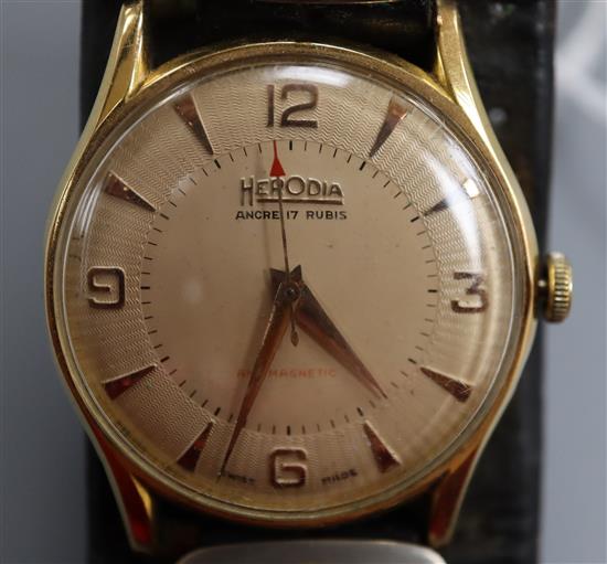 A gentlemans 1950s? 18k yellow metal Herodia manual wind wrist watch, on associated leather strap.